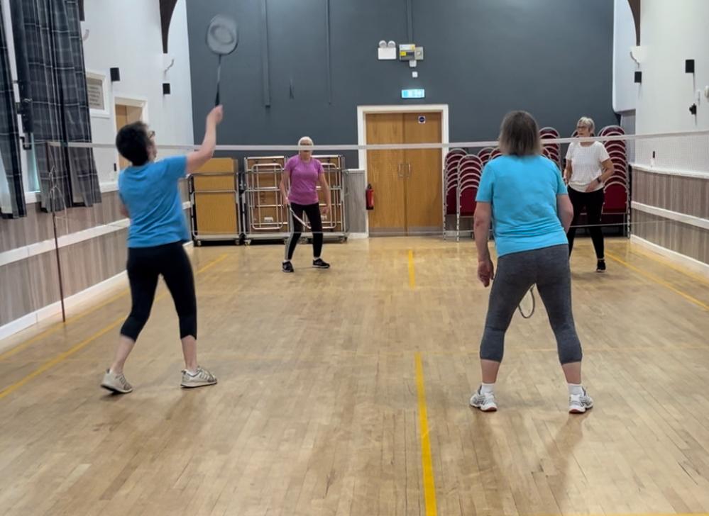 Badminton players in action
